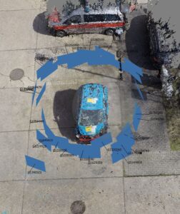 Aerial view of a car surrounded by a circular arrangement of markings. The image appears to be part of an analysis with Agisoft software for ADAS (Advanced Driver Assistance Systems).